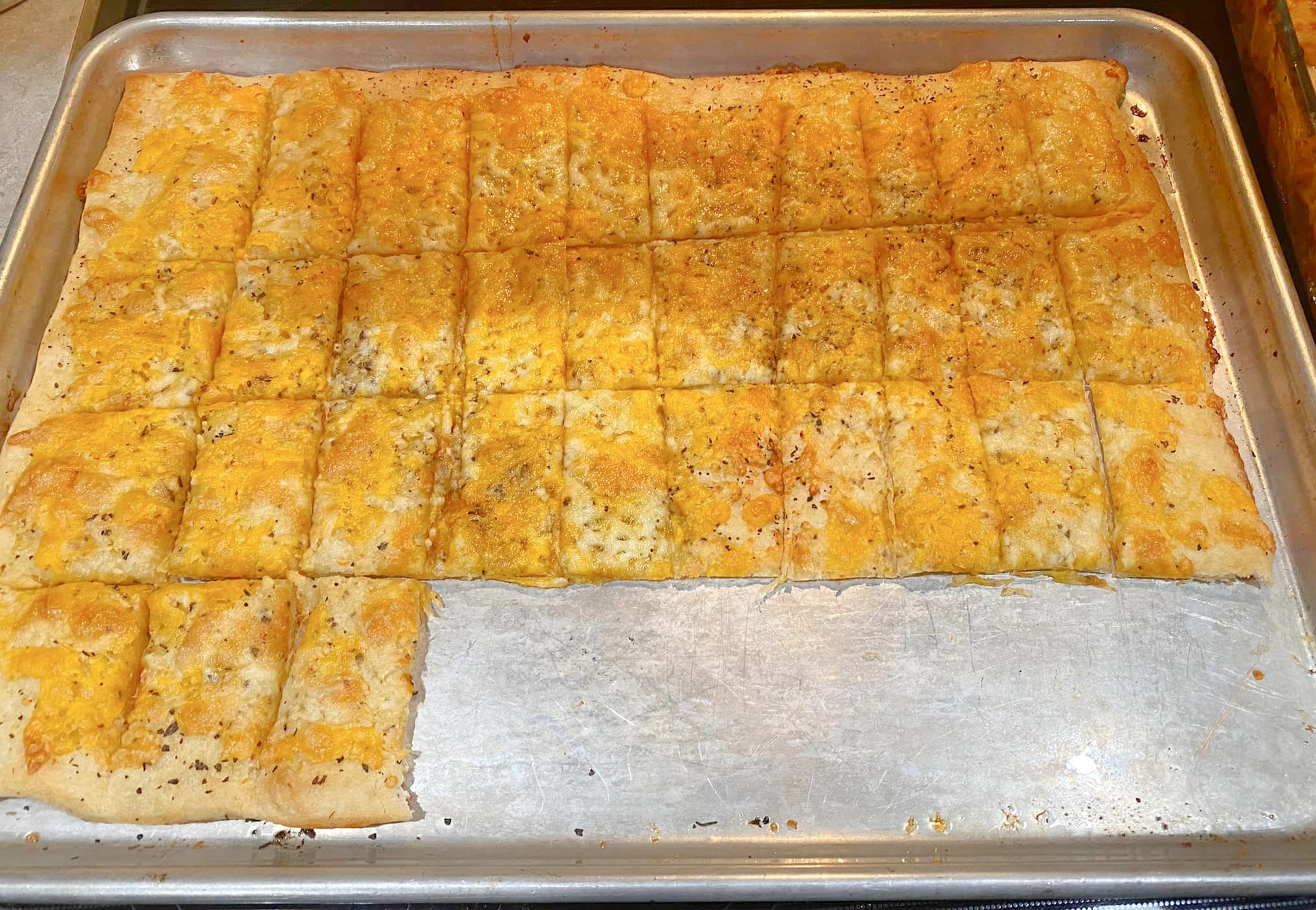 Cheese Flatbread Baked and Cut into Squares