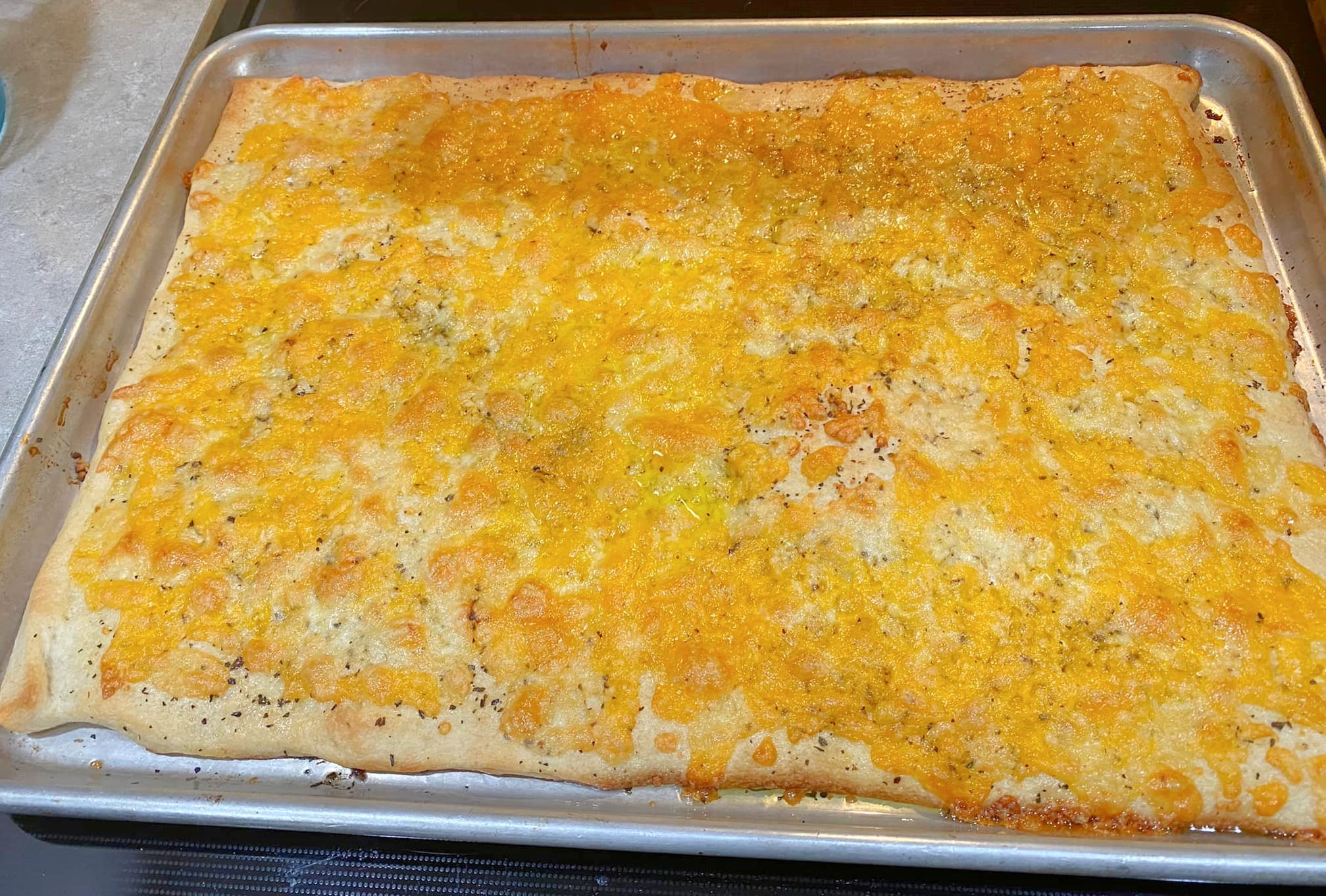 Cheese Flat Bread Baked on Baking Sheet