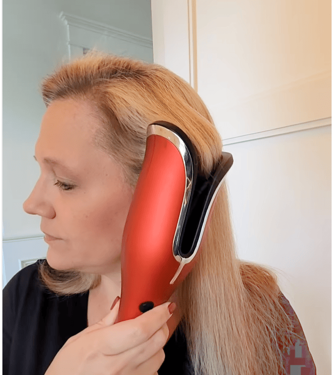 person holding red chi spin