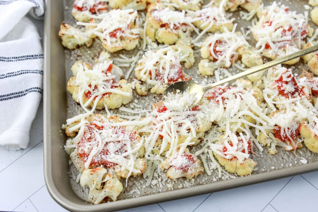 roasted cauliflower with cheese over top