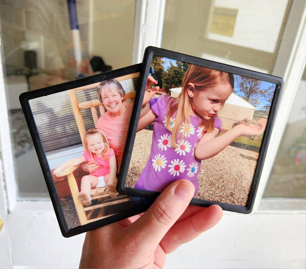 walgreens photo magnets held in hands