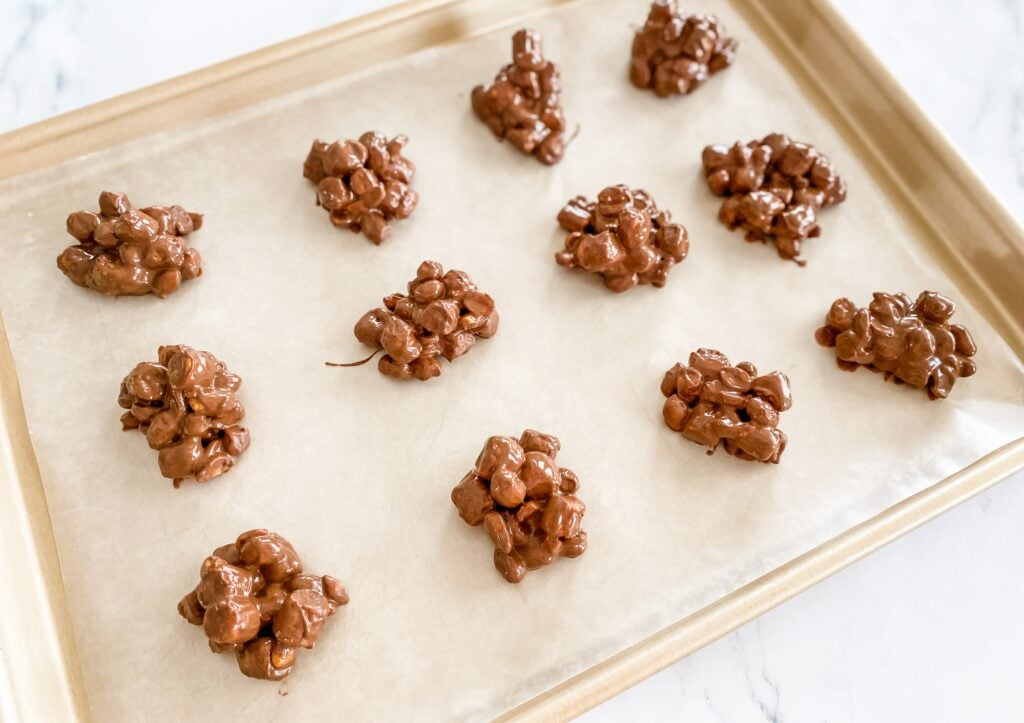 rocky road candy clusters on baking sheet