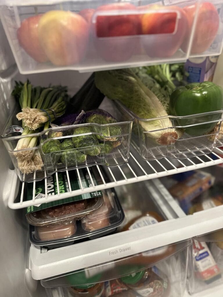 Greens stored in refrigerator bins 