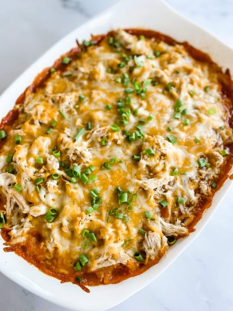 Chicken Tamale Casserole Finished in baking dish with cheese and green onions