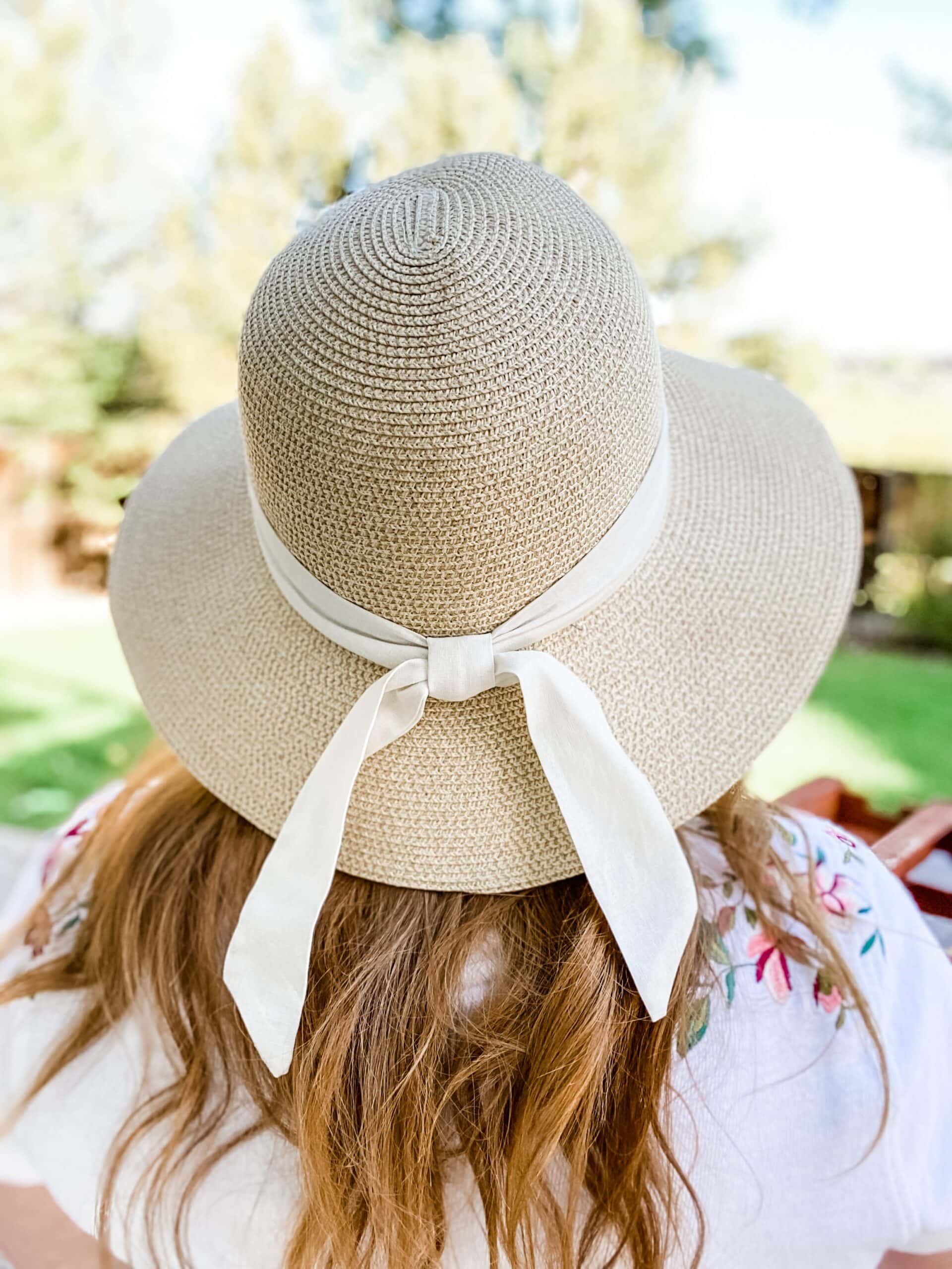 back of sun hat with white ribbon