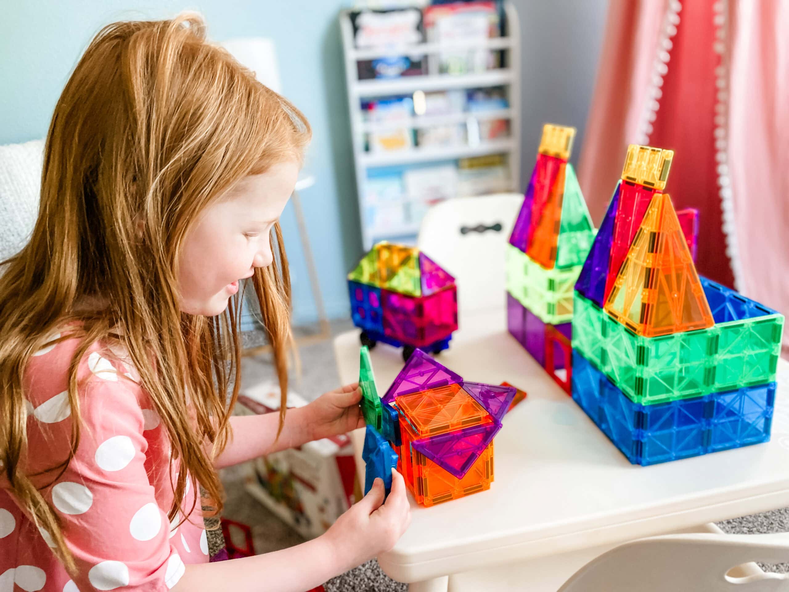 magnatiles set with child playing at table