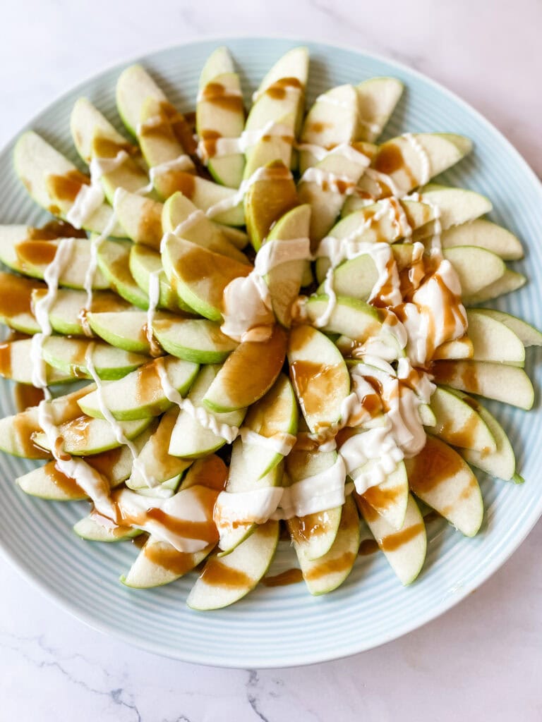 apple nachos on plate with toppings