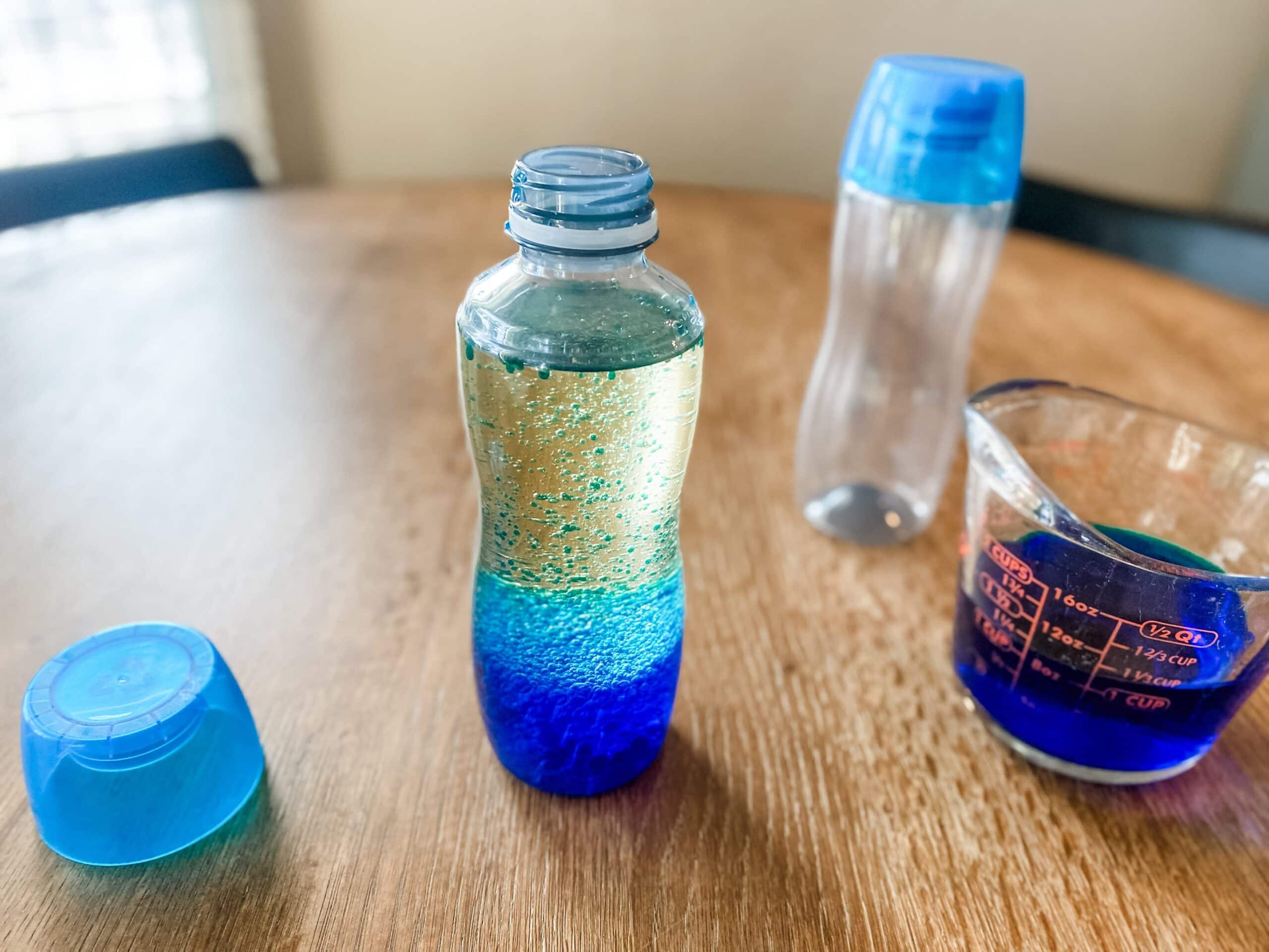 oil and food coloring in bottle for kids activity 