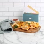 Cheesy Flatbread finished on platter with recipe box