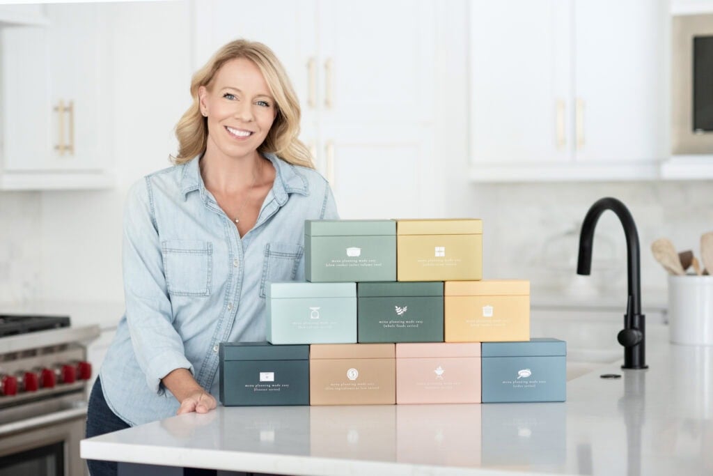 Laurie with 9 menu boxes whole foods