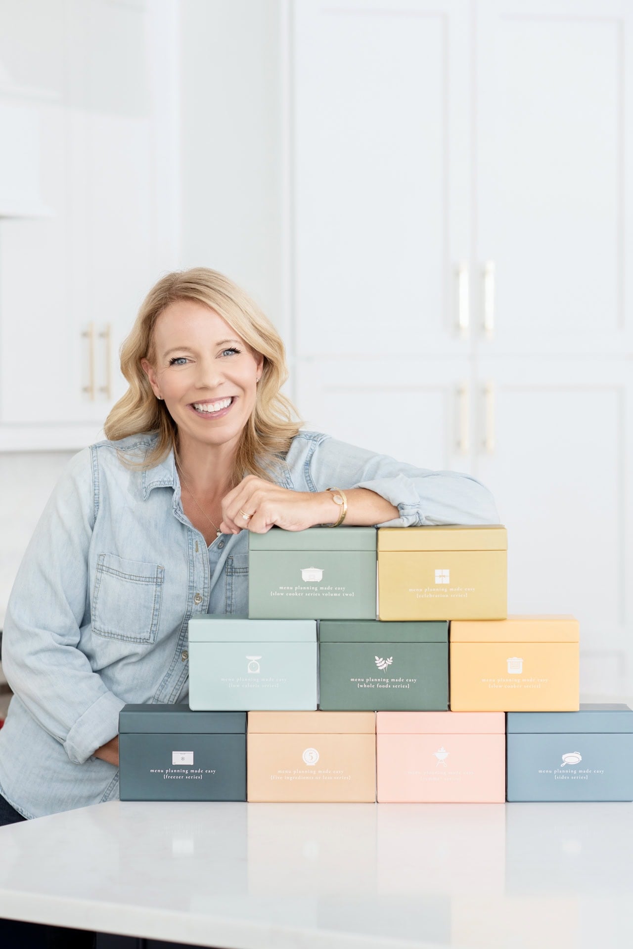 Laurie with 9 menu boxes whole foods