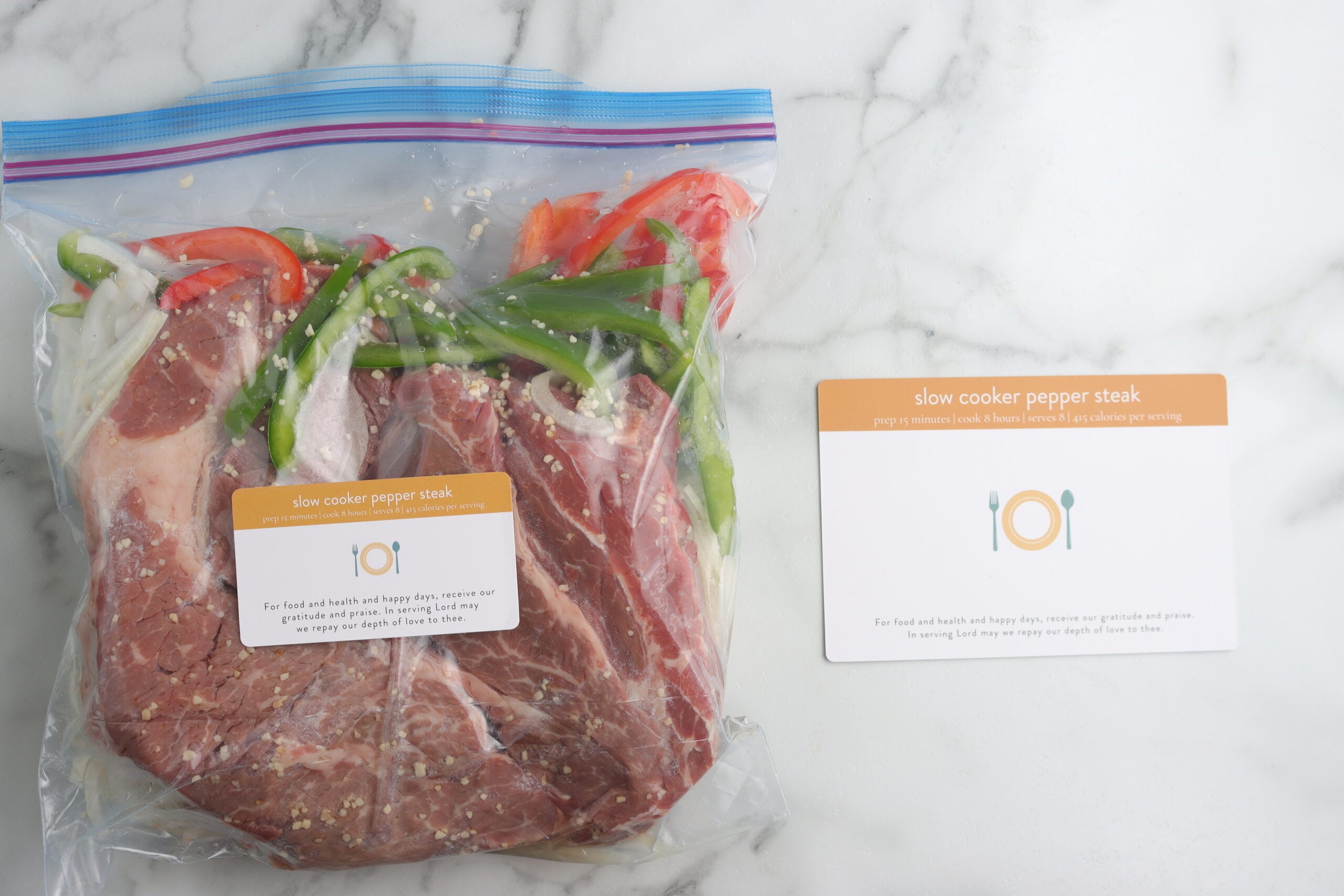 crockpot pepper steak in freezer bag with recipe card
