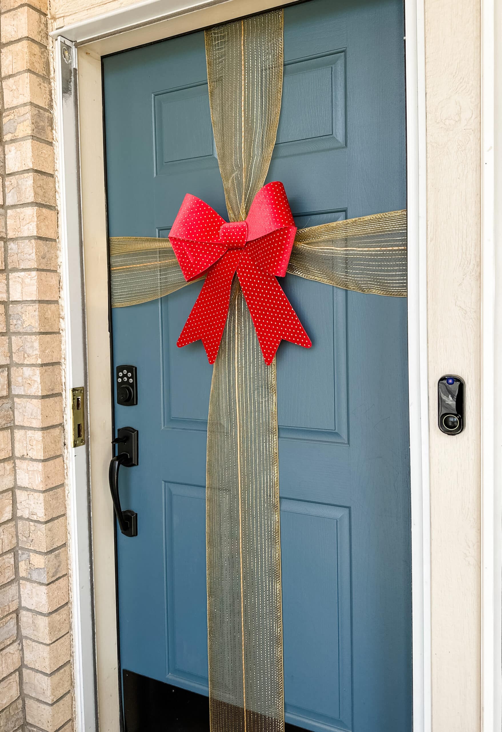 christmas bow on front door 