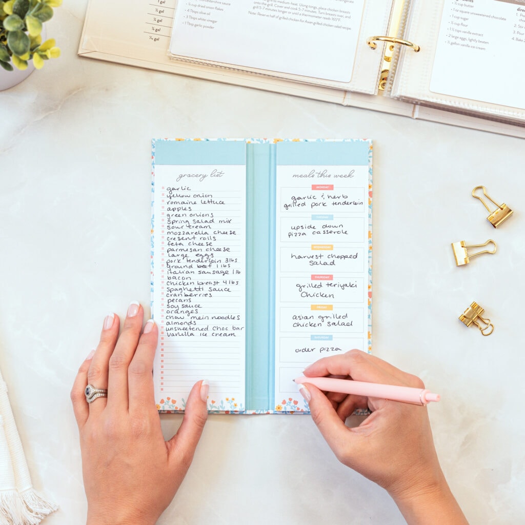 meal planning notepad on counter filled in