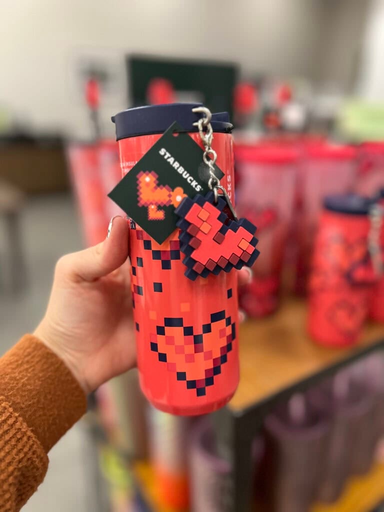 hot pink tumbler with charm