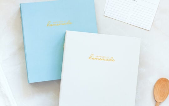 Blue and Cream recipe card binders on counter with recipe cards
