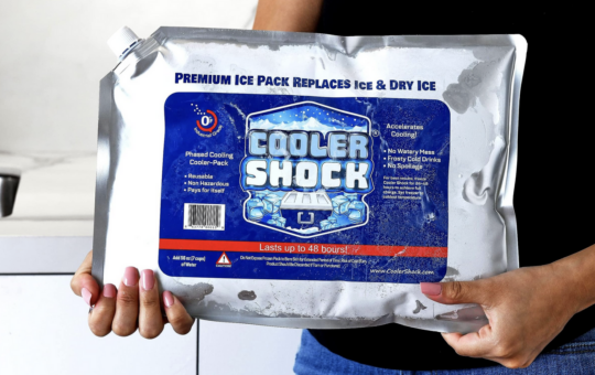 woman holding cooler shock