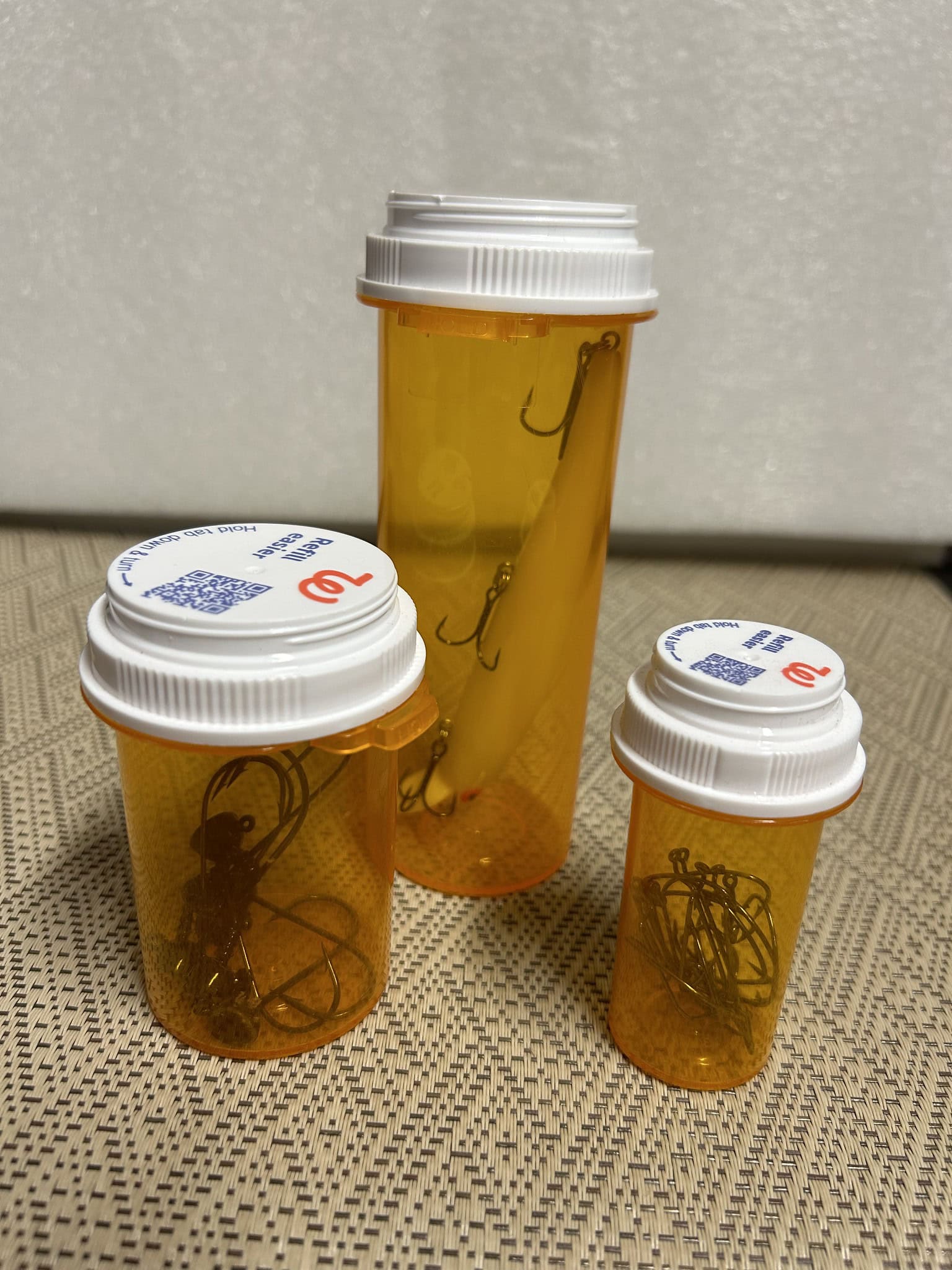 storing fishing lures in empty pill bottles