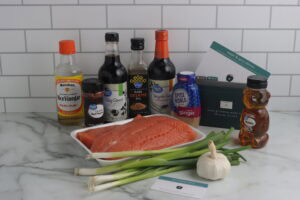 sweet and spicy salmon ingredients on countertop