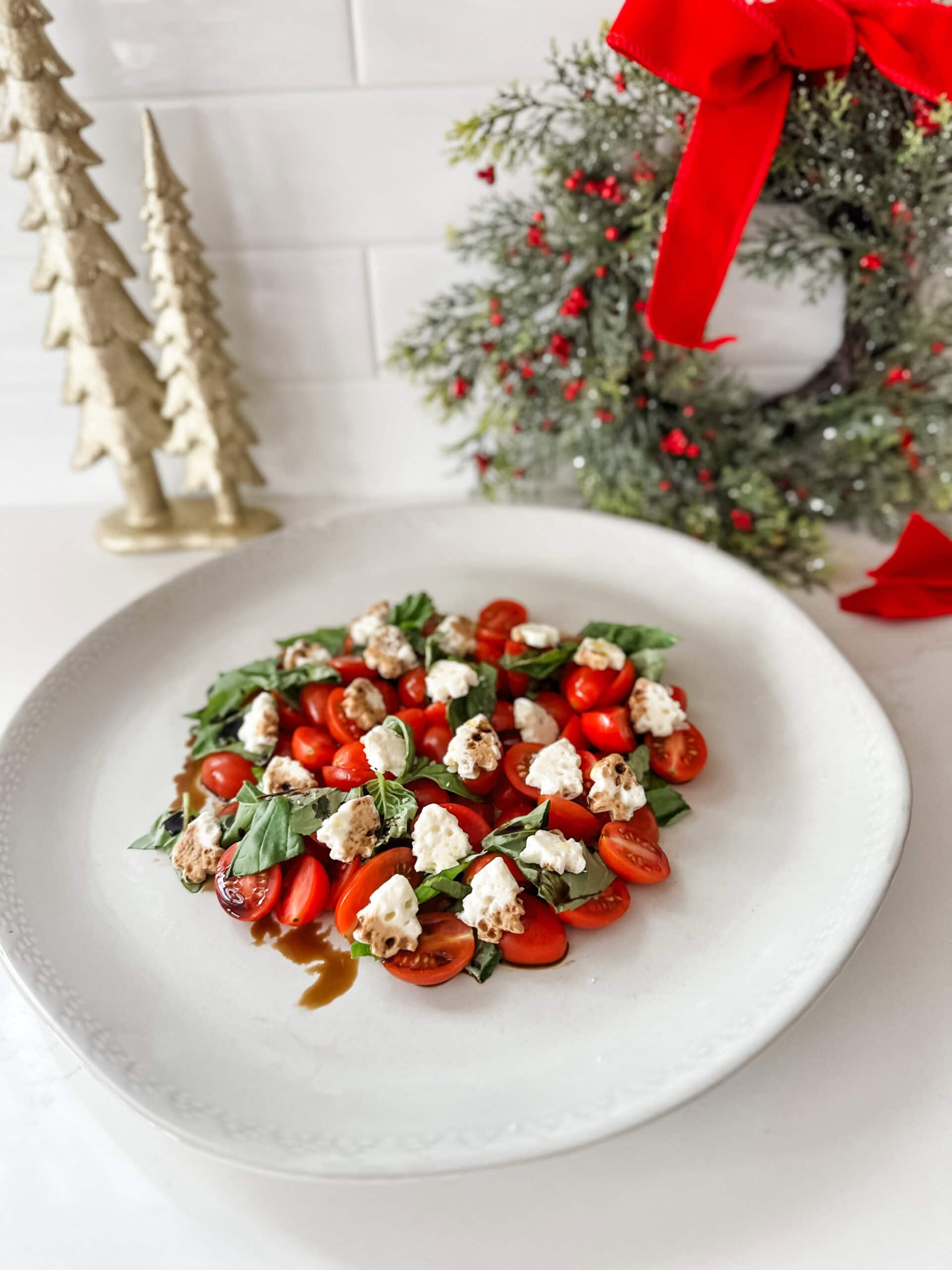 Christmas Caprese Salad on white plate 