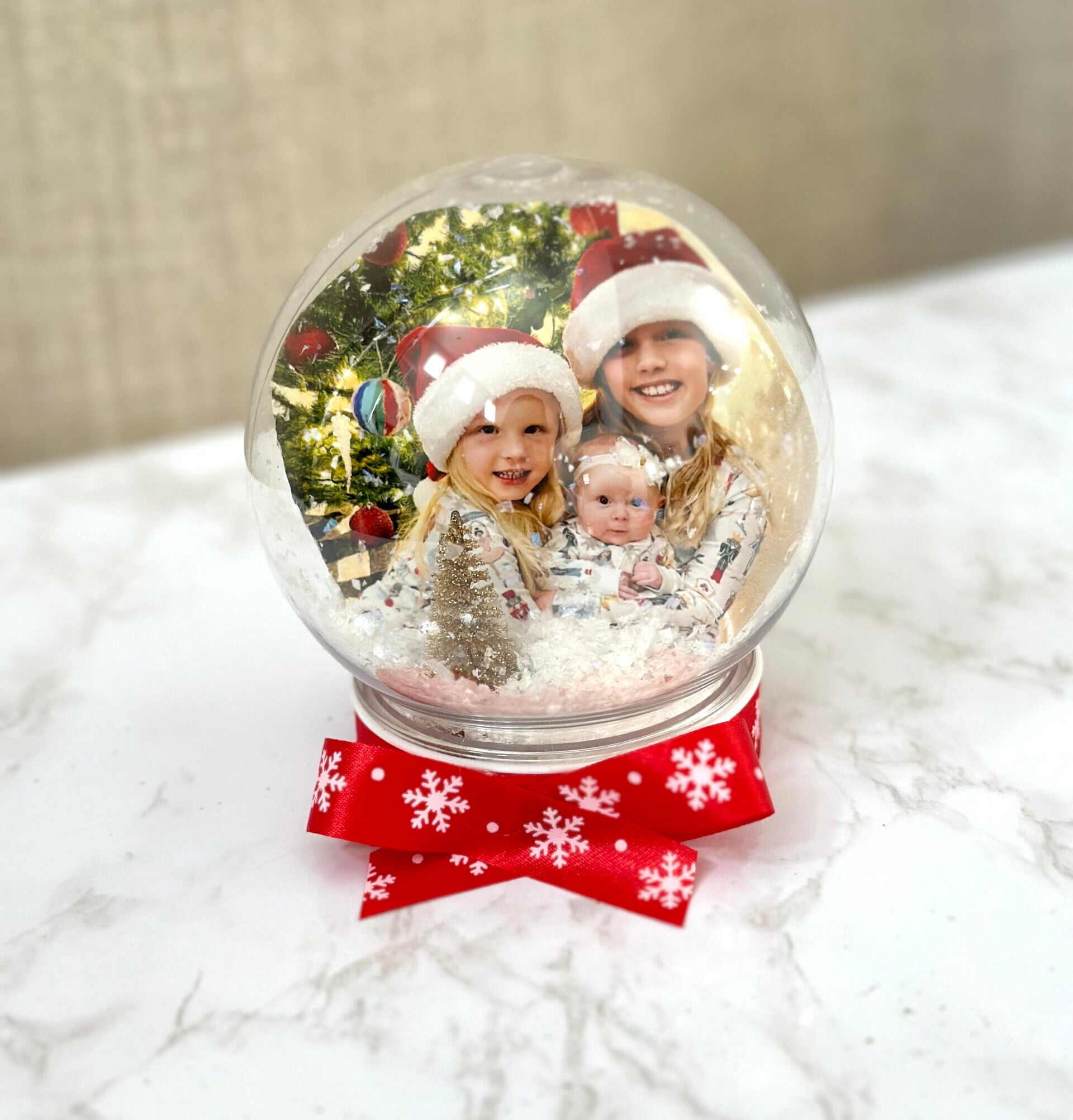 finished snow globe with photo inside 
