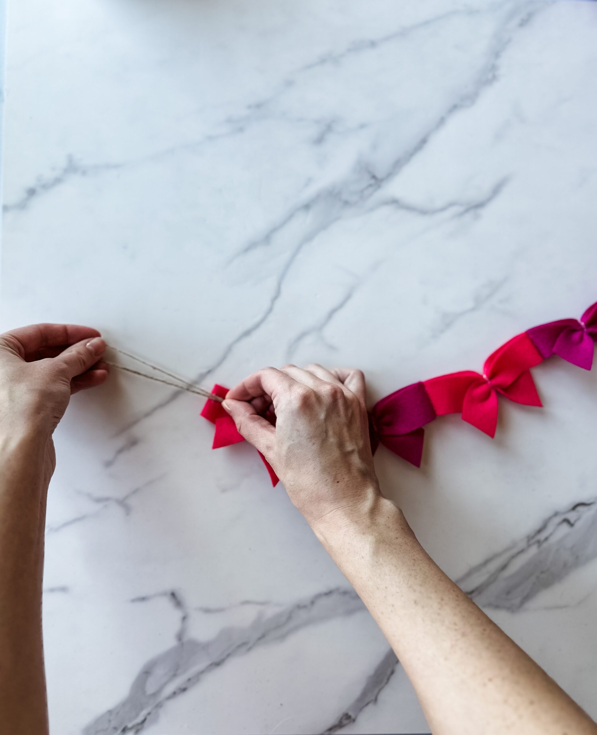 making bows into a garland 