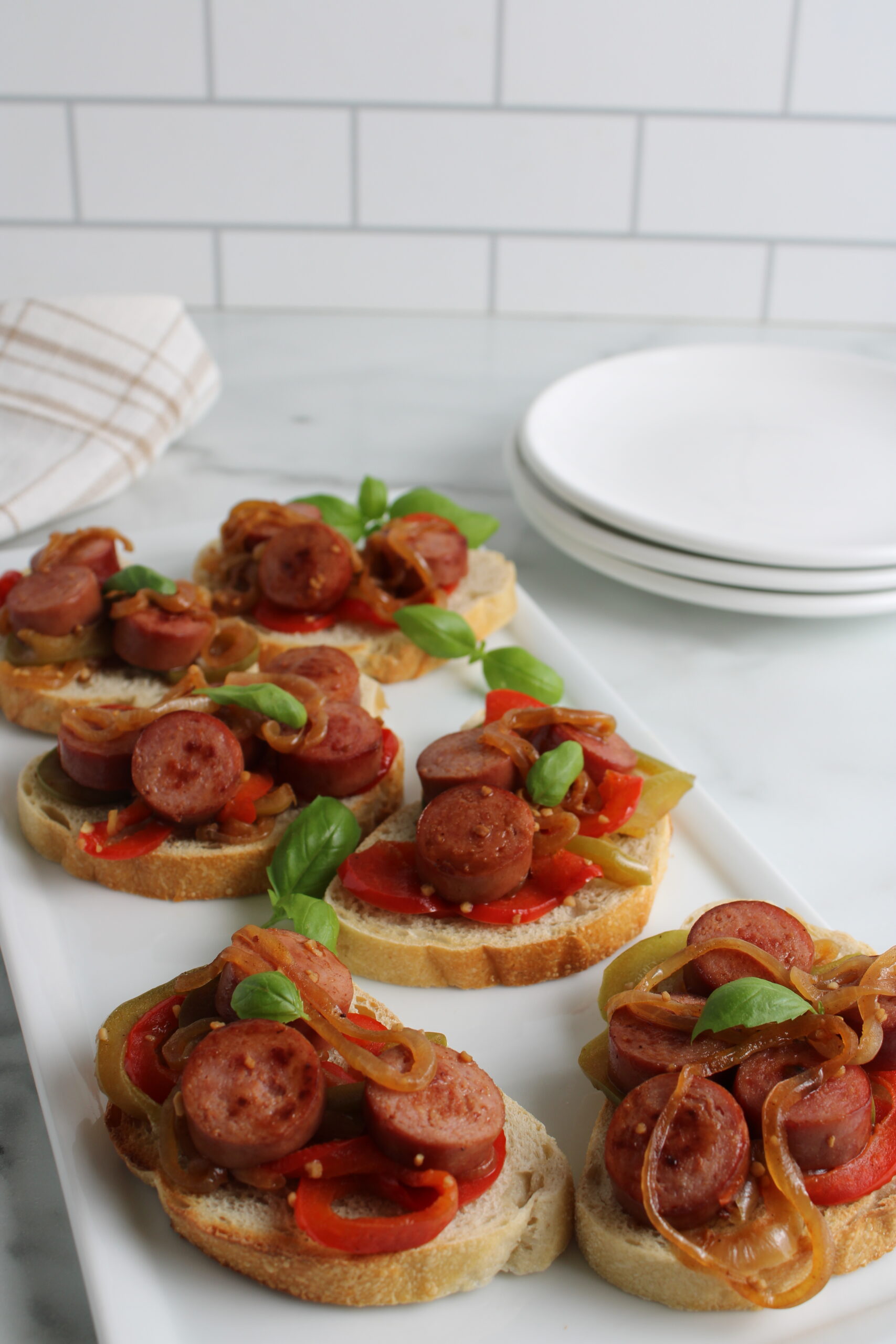 Sausage, Pepper, & Onion Sandwiches on bread 