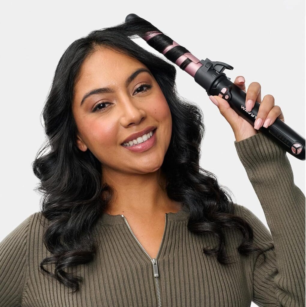 woman using wavytalk curling iron