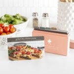 summer menu expansion box with card on outside