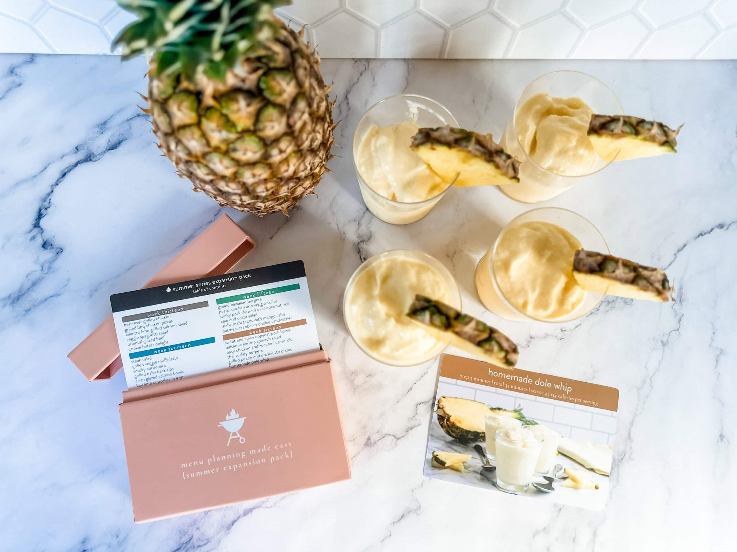 how to make dole whip recipes - recipe box with pineapples and dole whip in cups 