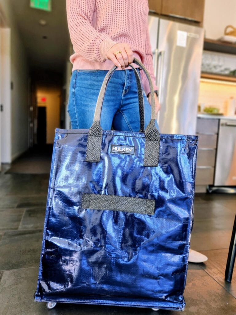 woman with blue Hulken bag