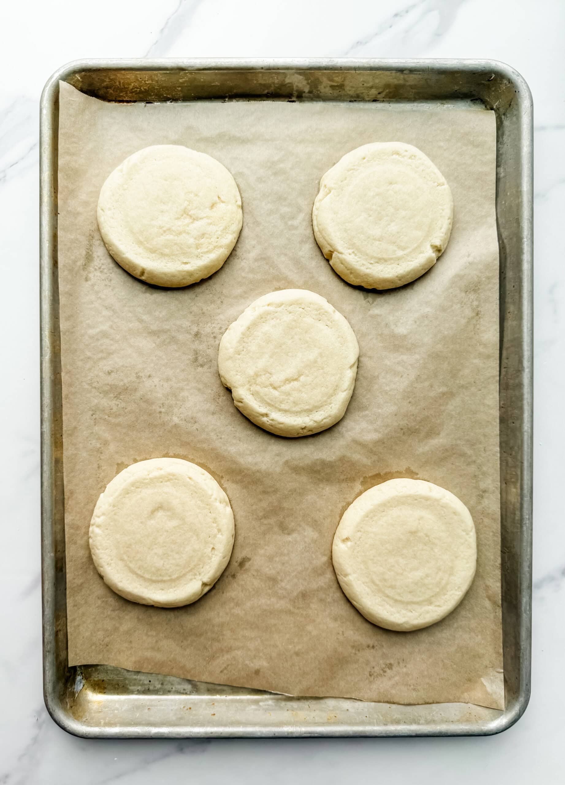 copycat crumbl cookies on a baking sheet 
