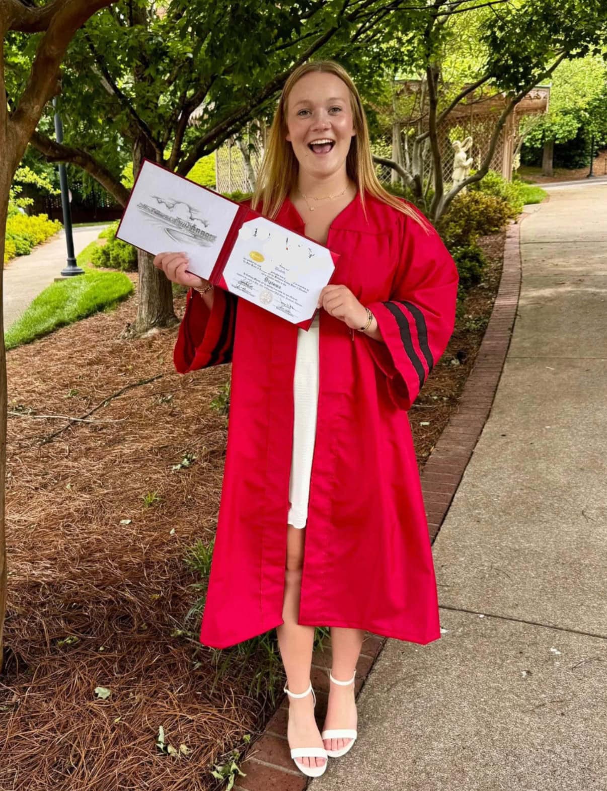 Freebies for College Students - girl in cap and gown with diploma