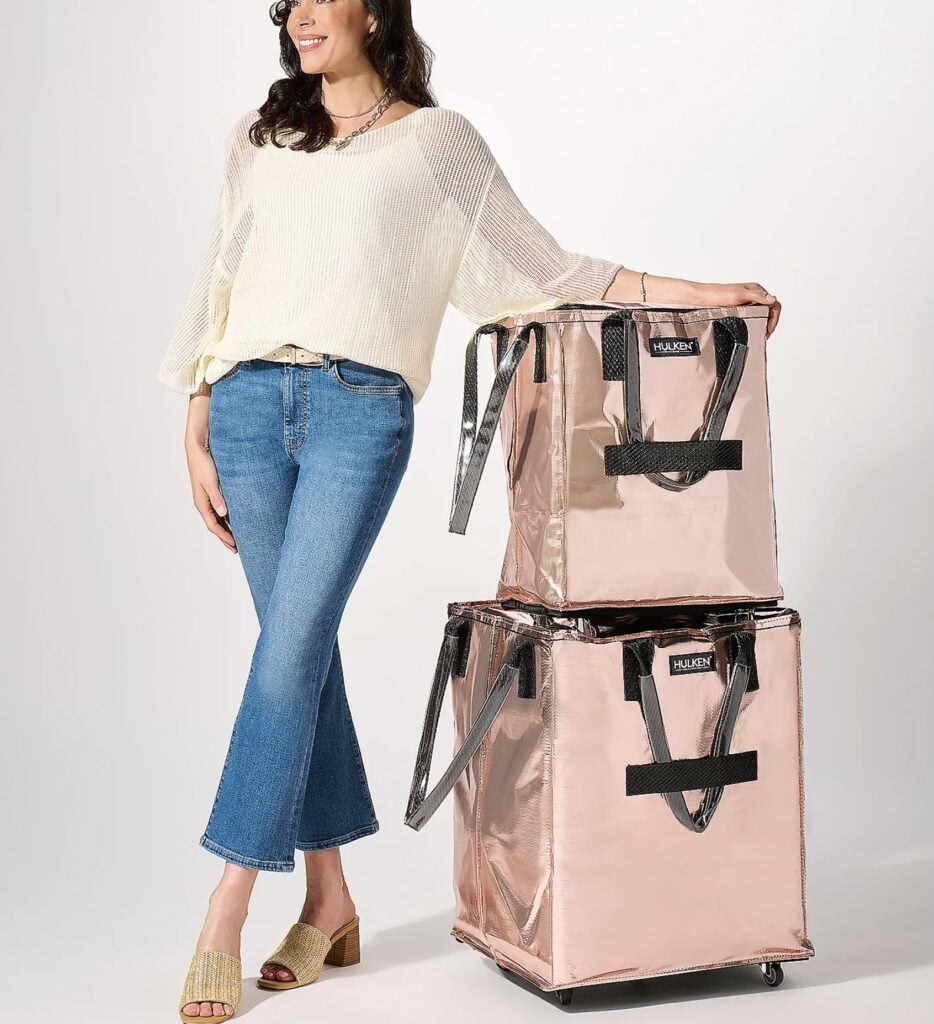 woman with 2 pink Hulken bags stacked