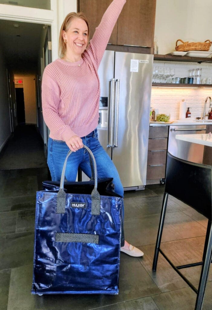 woman with blue Hulken bag