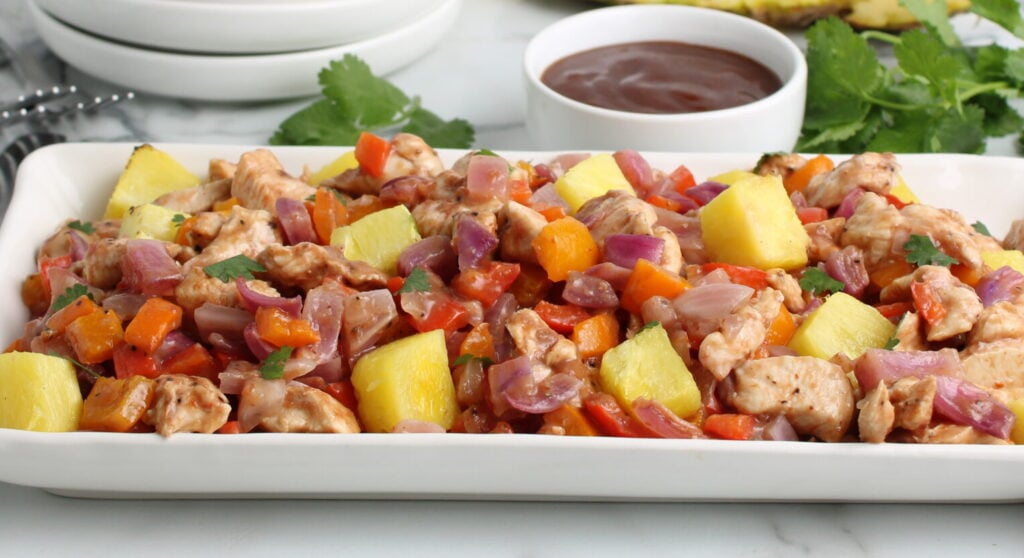 Sheet pan Hawaiian chicken on one large white platter