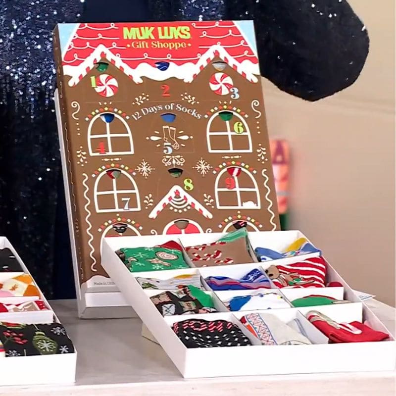 Muks Luks Advent Calendar sitting on table with socks showing