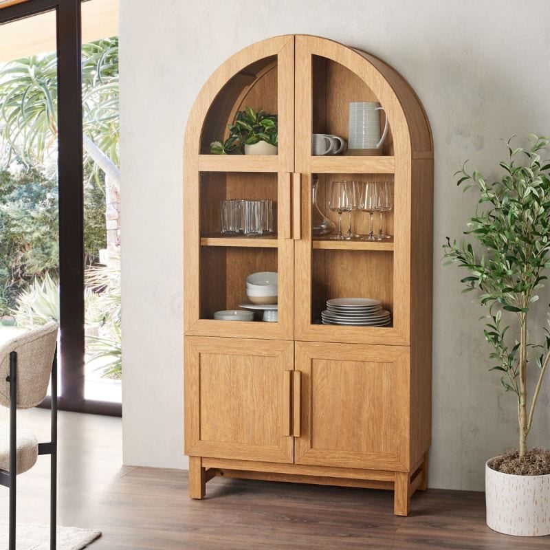 wood arch cabinet in living room