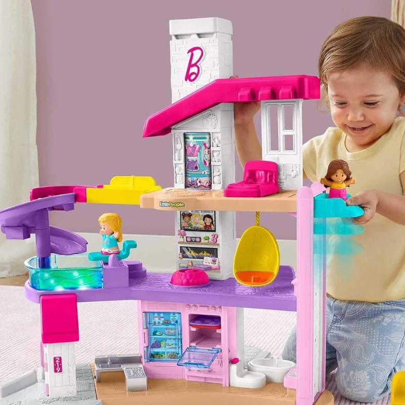 toddler playing with little people barbie dreamhouse