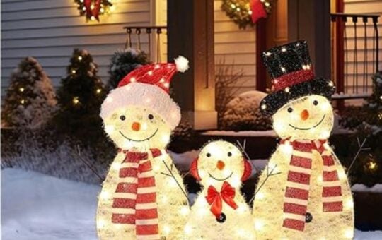 3 light up snowman family decorations outdoors