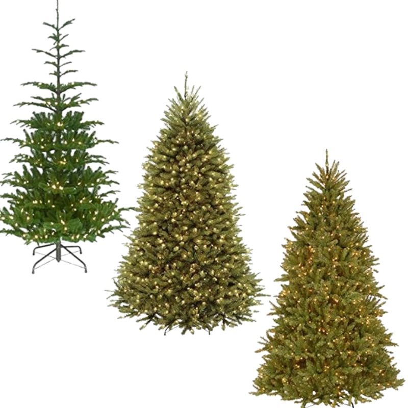 3 artificial Christmas trees with lights