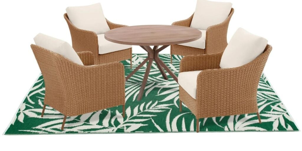 palm area rug with chairs