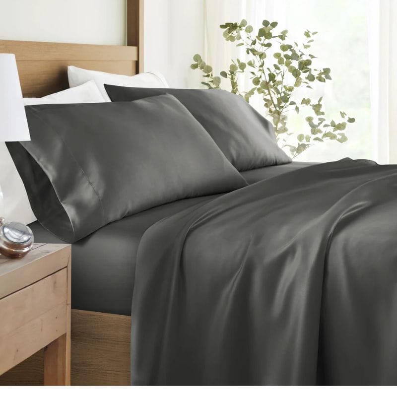 gray bamboo sheets on bed in bedroom