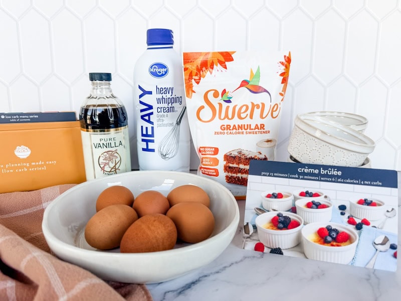 Crème Brûlée ingredients on counter with recipe card and box
