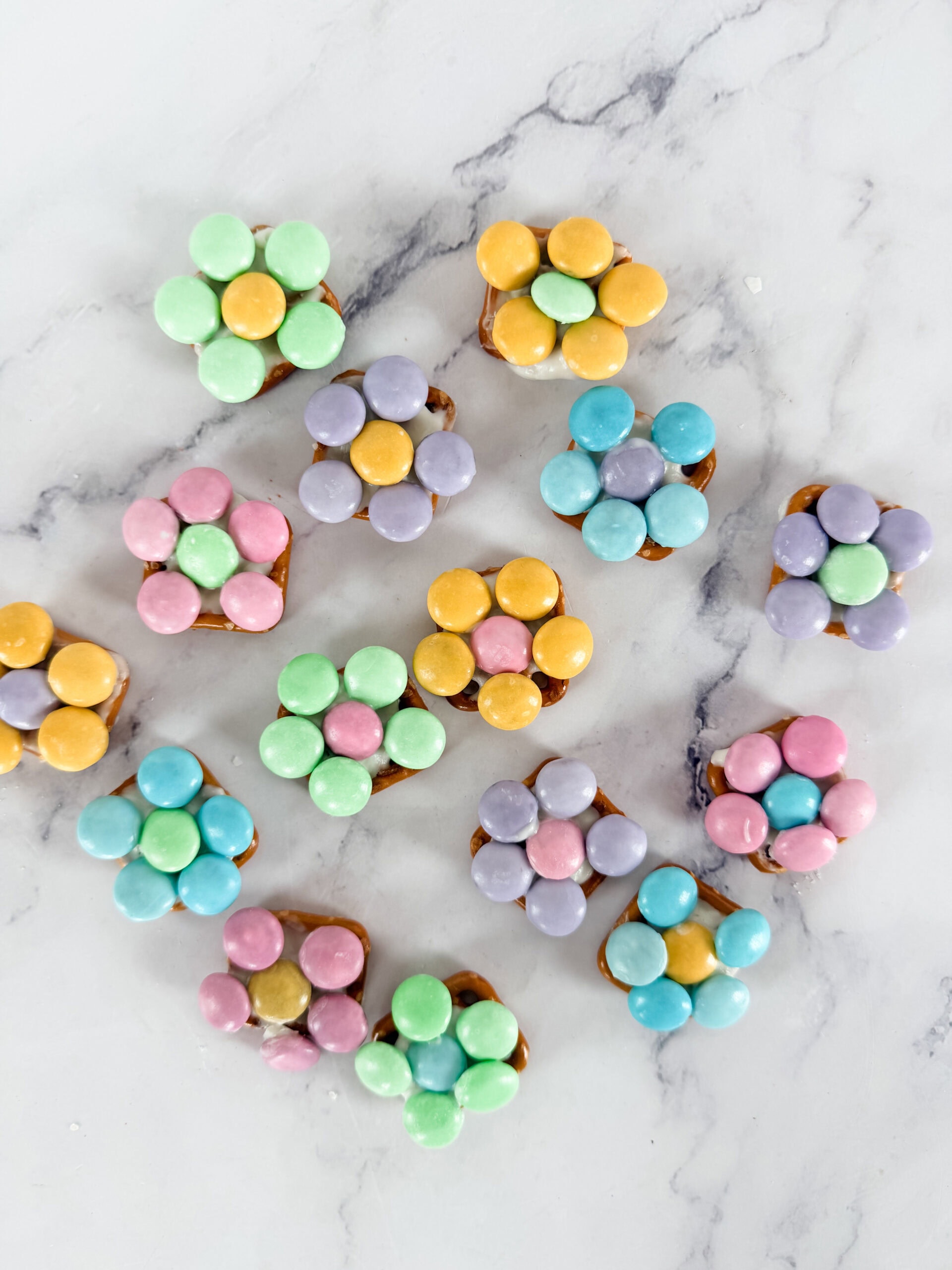 spring flower pretzel bites finished in different color patterns 