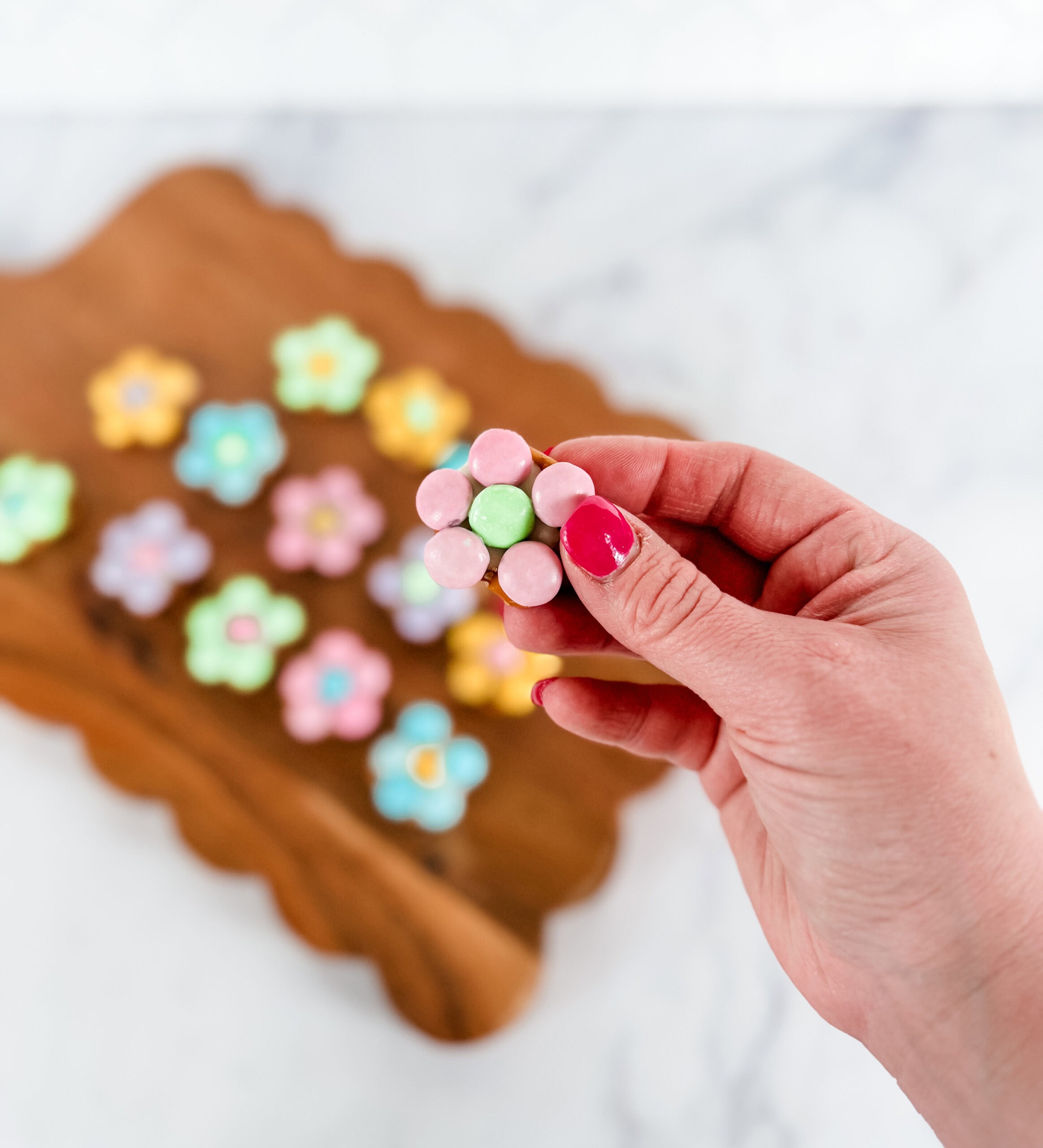 spring flower pretzel bites in hand