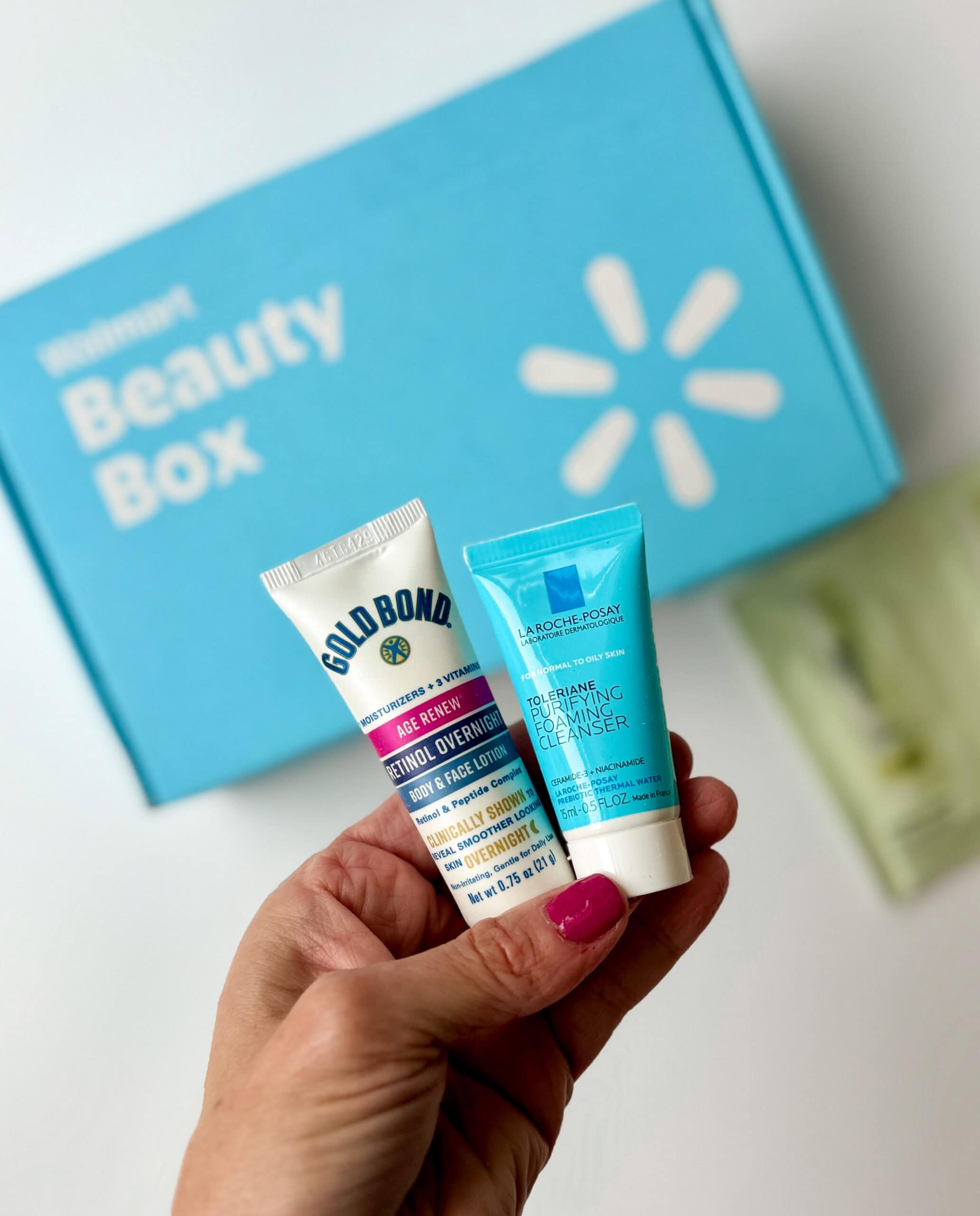walmart beauty box with samples in hand