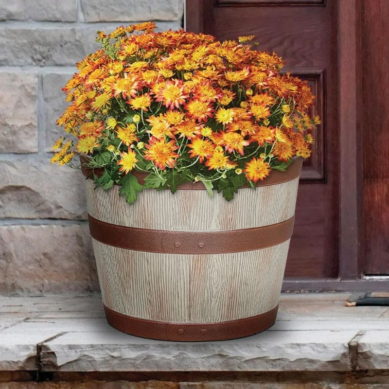 whiskey barrel planter on porch