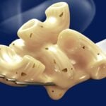 kraft deluxe mac and cheese on fork white cheddar garlic and herbs