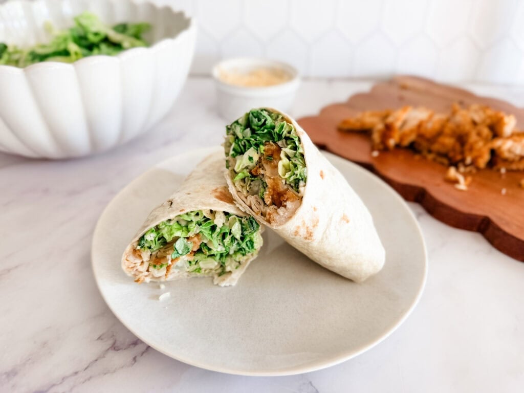 chicken caesar wraps on white plate